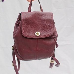 Plum/ Purple/ burgundy Coach backpack purse